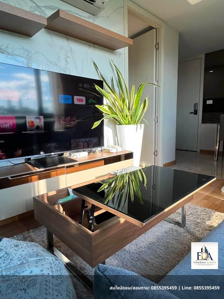 living room and bathroom of JRY Rama 9 Condominium
