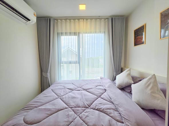 bedroom of Kave Wonderland Sales Gallery