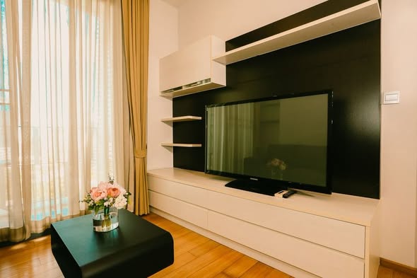 bedroom and living room of Keyne by Sansiri