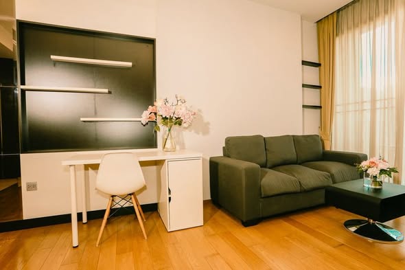 living room and bedroom of Keyne by Sansiri