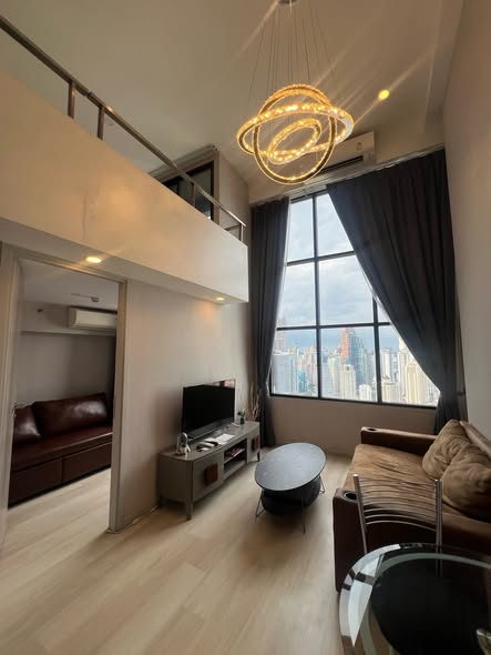 bedroom and living room of KnightsBridge Prime Sathon