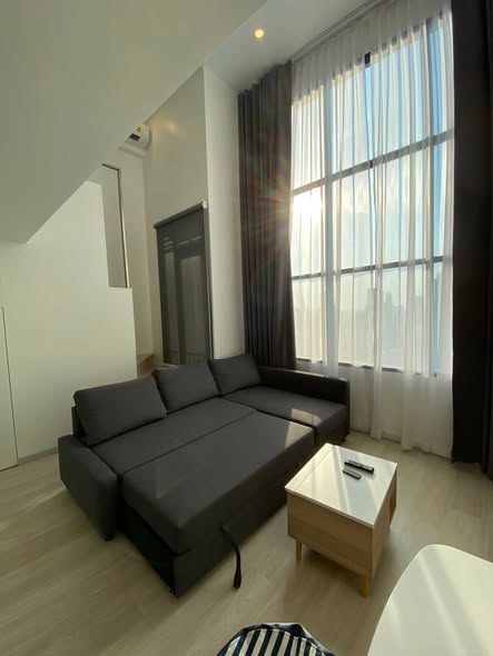 living room and bedroom of KnightsBridge Prime Sathon