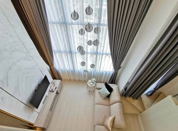 living room and bedroom of KnightsBridge Prime Sathon
