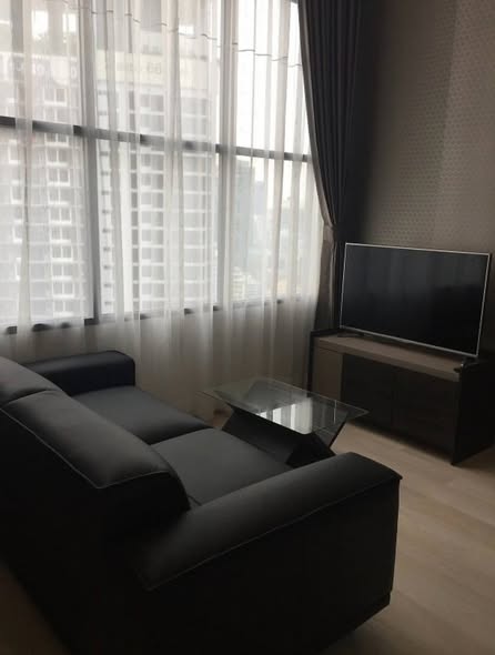 living room and bedroom of KnightsBridge Prime Sathon