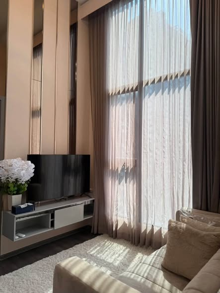 living room and bedroom of KnightsBridge Space Rama9