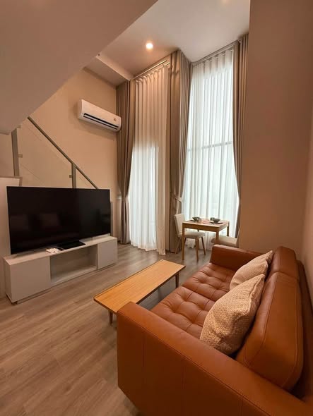 living room and bedroom of KnightsBridge Space Sukhumvit-Rama 4