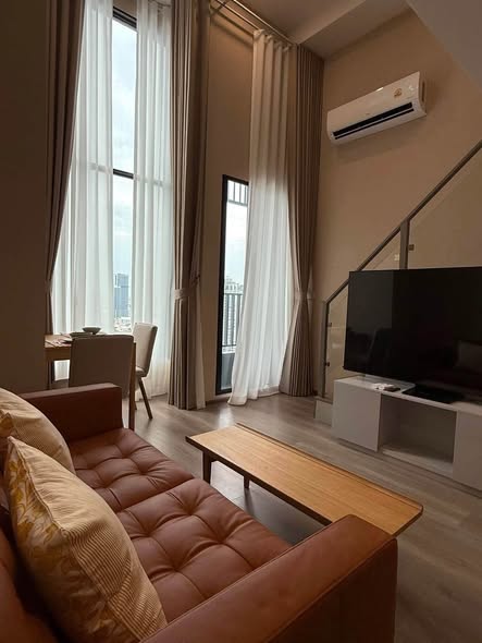 living room and bedroom of KnightsBridge Space Sukhumvit-Rama 4
