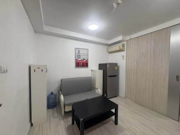 bedroom of L Style Condo