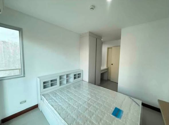 bedroom of Le Rich Condominium