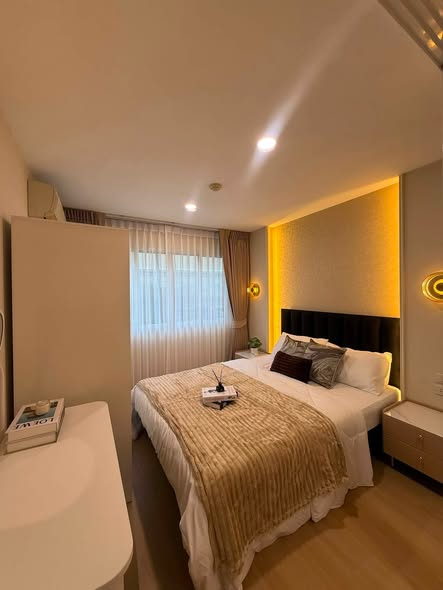 bedroom of Lumpini Condo Town Bodindecha-Ramkhamhaeng