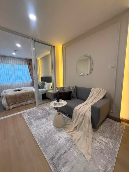 bedroom and living room of Lumpini Condo Town Bodindecha-Ramkhamhaeng