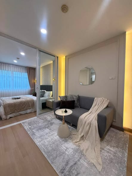 bedroom and living room of Lumpini Condo Town Bodindecha-Ramkhamhaeng