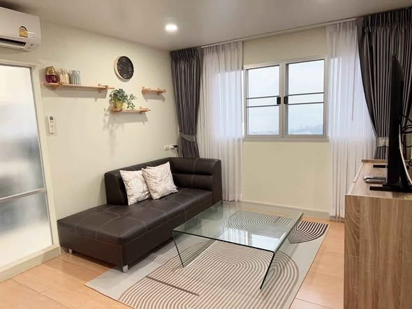 bedroom and living room of Lumpini Condo Town North Pattaya-Sukumvit