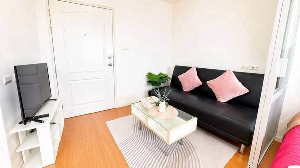 living room and bedroom of Lumpini Condo Town North Pattaya-Sukumvit