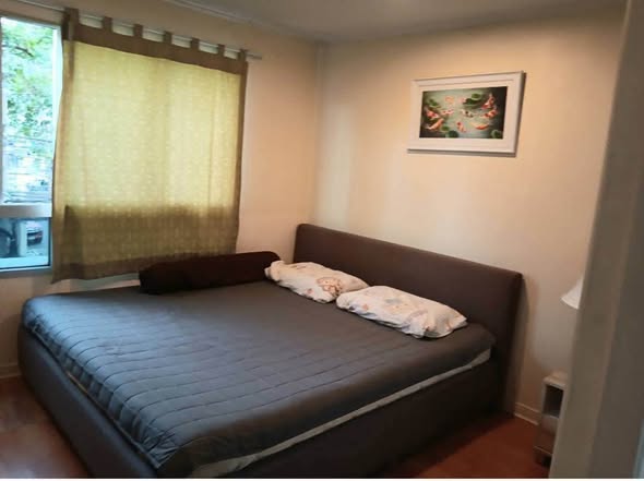 bedroom of Lumpini Ville Cultural Center