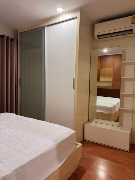 bedroom of Lumpini Ville Cultural Center