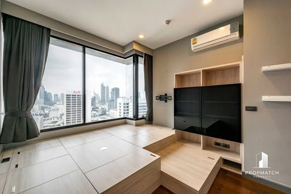 bedroom and living room of M Silom