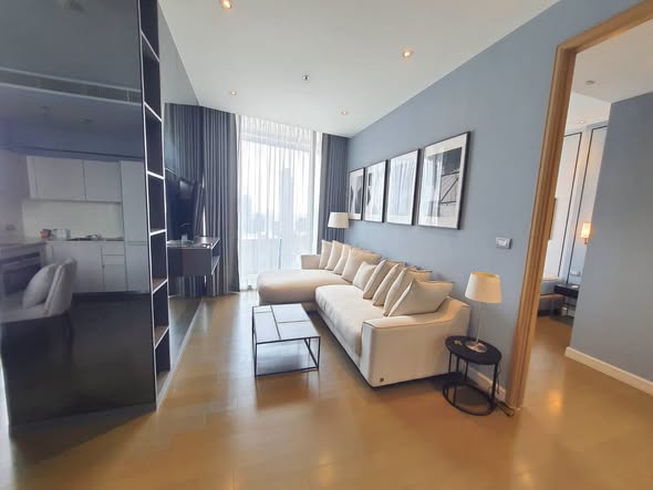 living room and bedroom of Magnolias Ratchadamri Boulevard