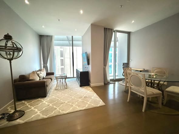 living room and bedroom of Magnolias Ratchadamri Boulevard