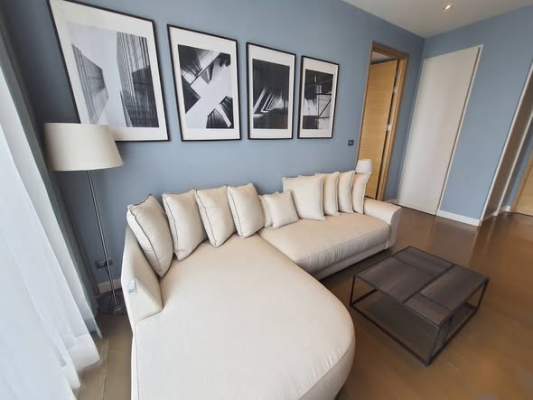 living room and bedroom of Magnolias Ratchadamri Boulevard