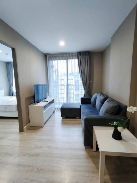 bedroom and living room of Metro Luxe Ratchada