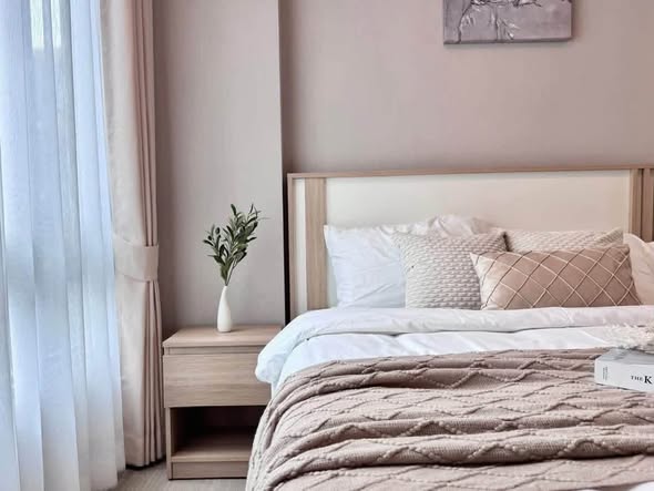 bedroom of Metro Luxe Riverfront Rattanathibet
