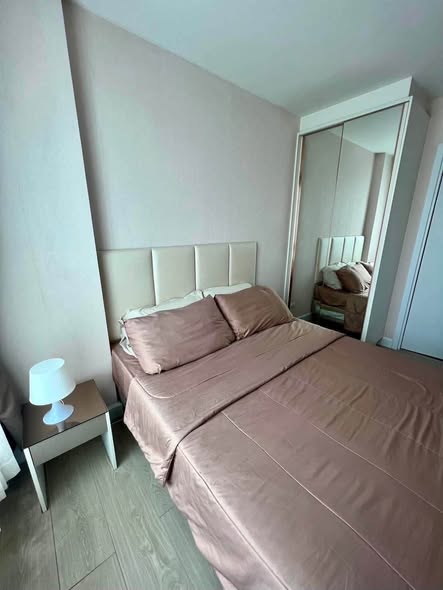 bedroom of Metro Luxe Riverfront Rattanathibet