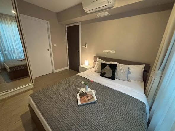 bedroom of Metro Luxe Riverfront Rattanathibet