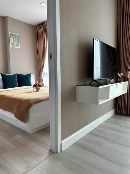 bedroom of Metro Luxe Riverfront Rattanathibet