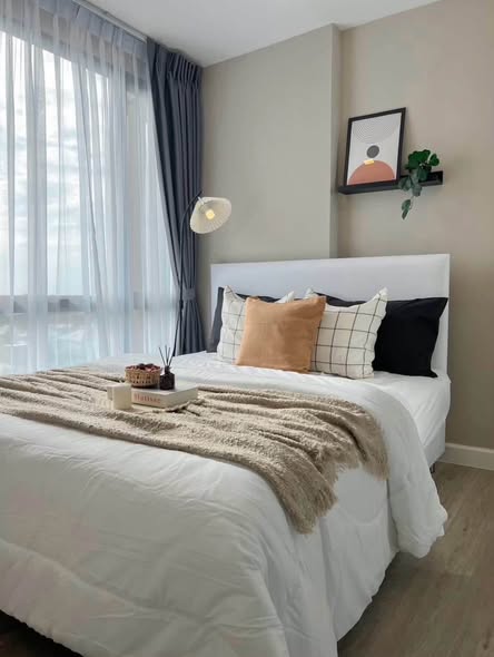 bedroom of Metro Luxe Riverfront Rattanathibet