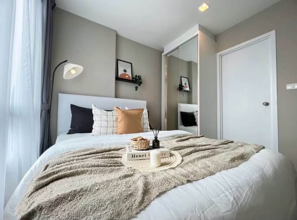 bedroom of Metro Luxe Riverfront Rattanathibet