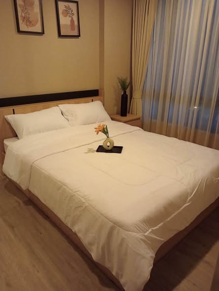 bedroom of Metro Luxe Riverfront Rattanathibet