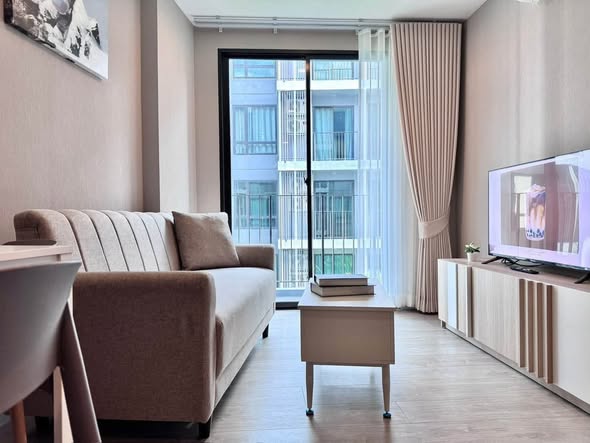 bedroom and living room of Metro Luxe Riverfront Rattanathibet