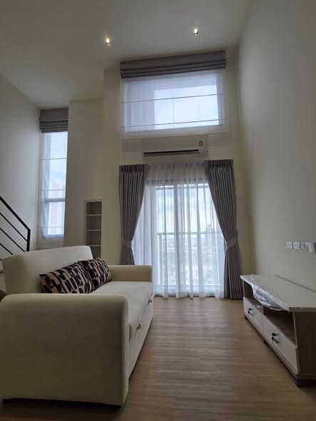 bedroom and living room of Na Reva Charoennakhon