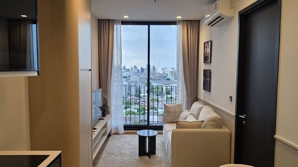bedroom and living room of Noble Around Ari