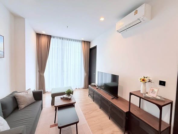 bedroom and living room of Noble Around Ari