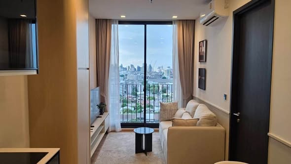 living room and bedroom of Noble Around Ari