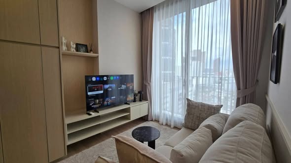 living room and bedroom of Noble Around Ari