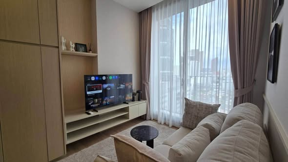 living room and bedroom of Noble Around Ari