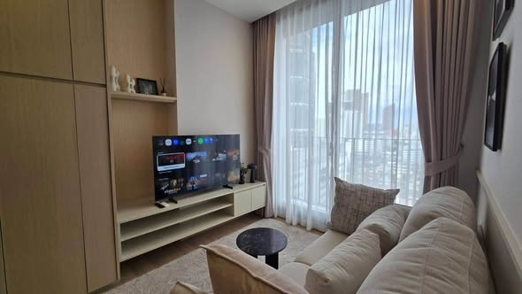 living room and bedroom of Noble Around Ari