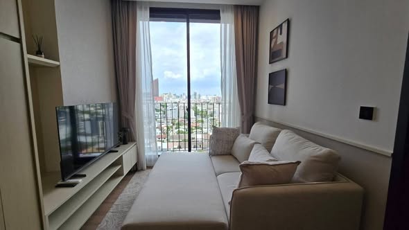 living room and bedroom of Noble Around Ari