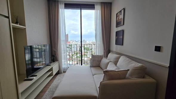 living room and bedroom of Noble Around Ari