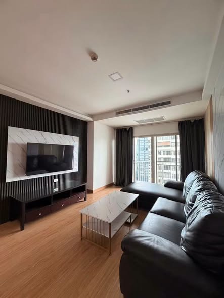 bedroom and living room of Noble Ora