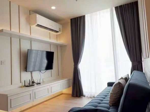 bedroom and living room of Noble Recole