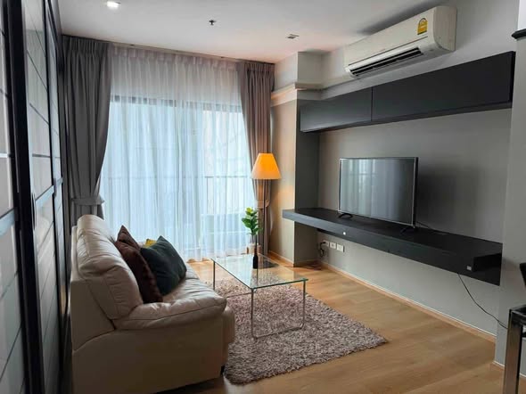 bedroom and living room of Noble Remix
