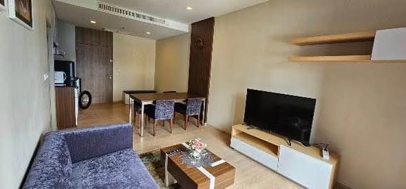 bedroom and living room of Noble Reveal