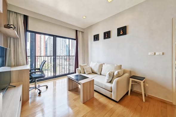 bedroom and living room of Noble Reveal