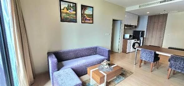 bedroom and living room of Noble Reveal