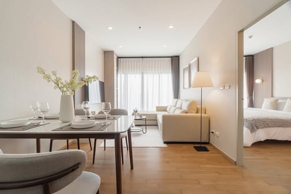living room and bedroom of Noble Reveal