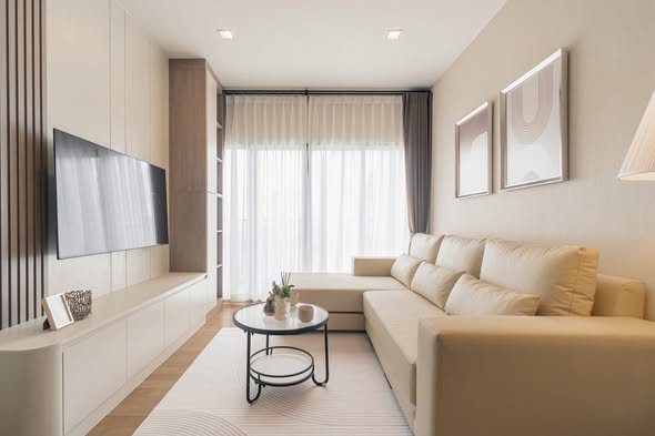 living room and bedroom of Noble Reveal